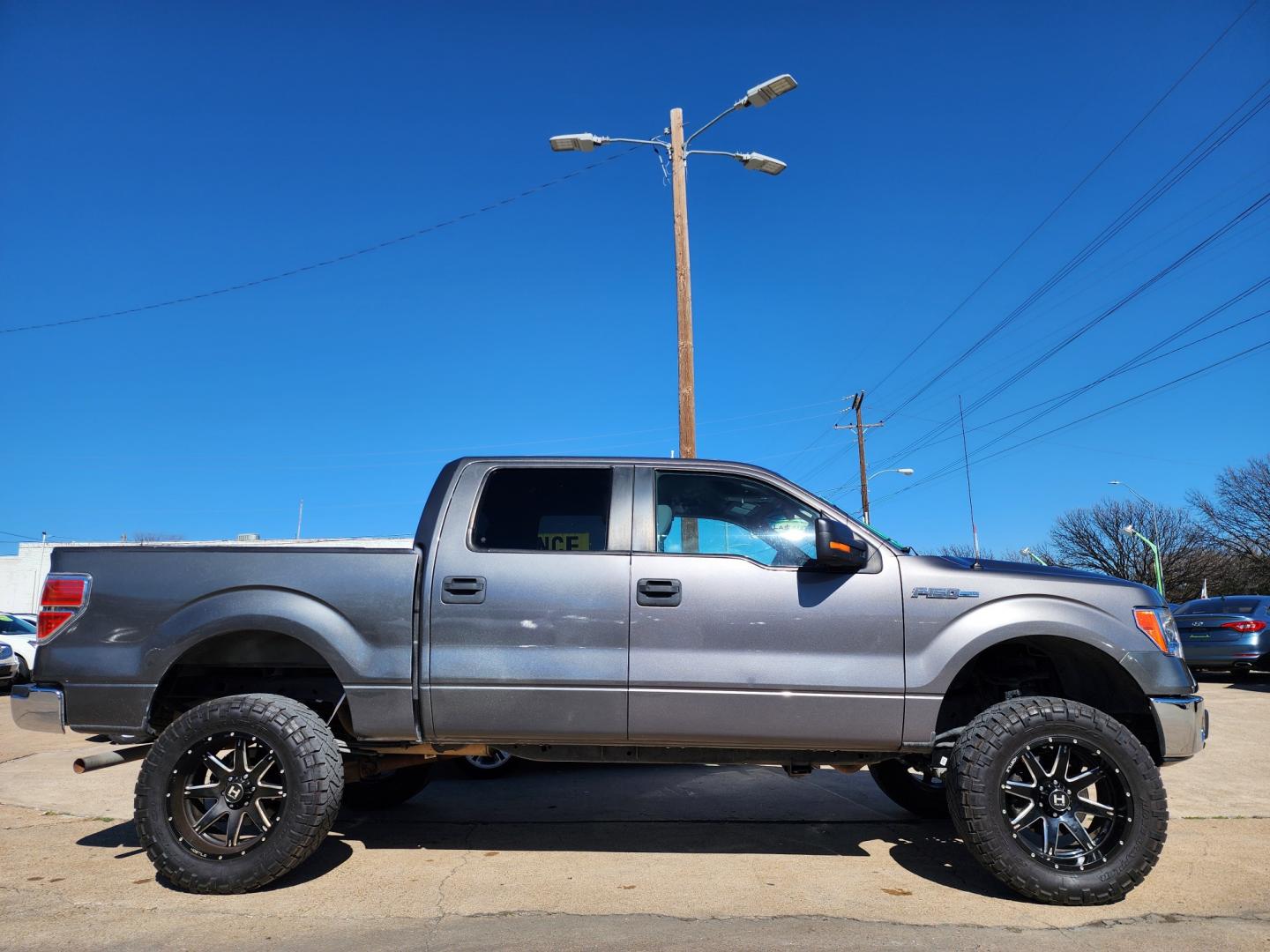 2014 GRAY Ford F-150 XLT SuperCrew (1FTEW1CM4EF) with an 3.7L V6 DOHC 24V engine, 6-Speed Automatic transmission, located at 2660 S.Garland Avenue, Garland, TX, 75041, (469) 298-3118, 32.885387, -96.656776 - Welcome to DallasAutos4Less, one of the Premier BUY HERE PAY HERE Dealers in the North Dallas Area. We specialize in financing to people with NO CREDIT or BAD CREDIT. We need proof of income, proof of residence, and a ID. Come buy your new car from us today!! This is a very well cared for 2014 FO - Photo#2